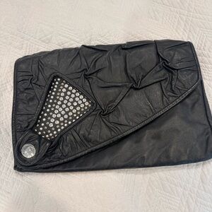 Vintage black and studded rockstar clutch. Excellent condition!